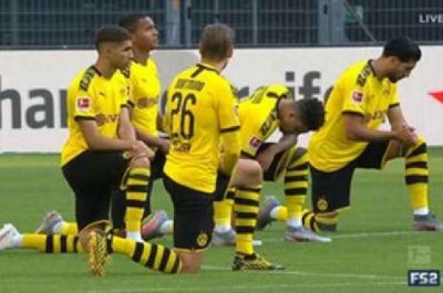 Soccer: Hertha and Dortmund players kneel in tribute to George Floyd