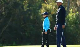 Tiger and son Charlie four shots back in Orlando team event