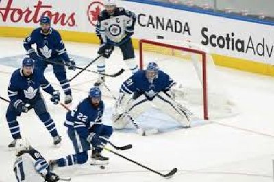 Mitchell Marner’s two goals guide Leafs over Jets