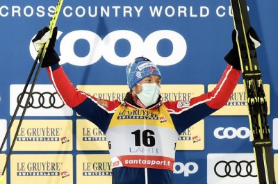 Nordic skiing-Iversen takes 50km gold for Norway after Klaebo disqualified