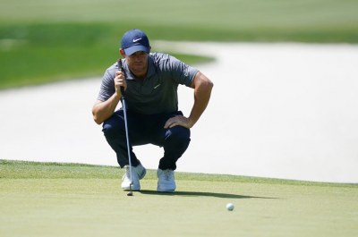 Golf-Reigning champion McIlroy set to miss cut at Players Championship