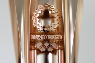 ‘No silver bullet’: torch relay struggles highlight hurdles for pandemic Olympics