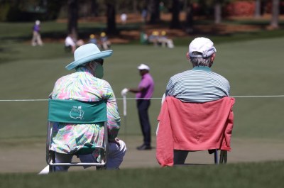 Golf-Natural order restored as spectators return to Augusta National