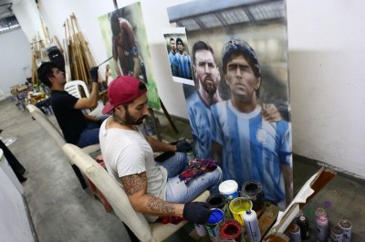 Argentine artist channels ‘hand of God’ with Maradona portraits